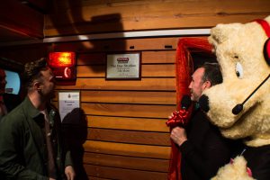 A new plaque is placed in the refurbished studio